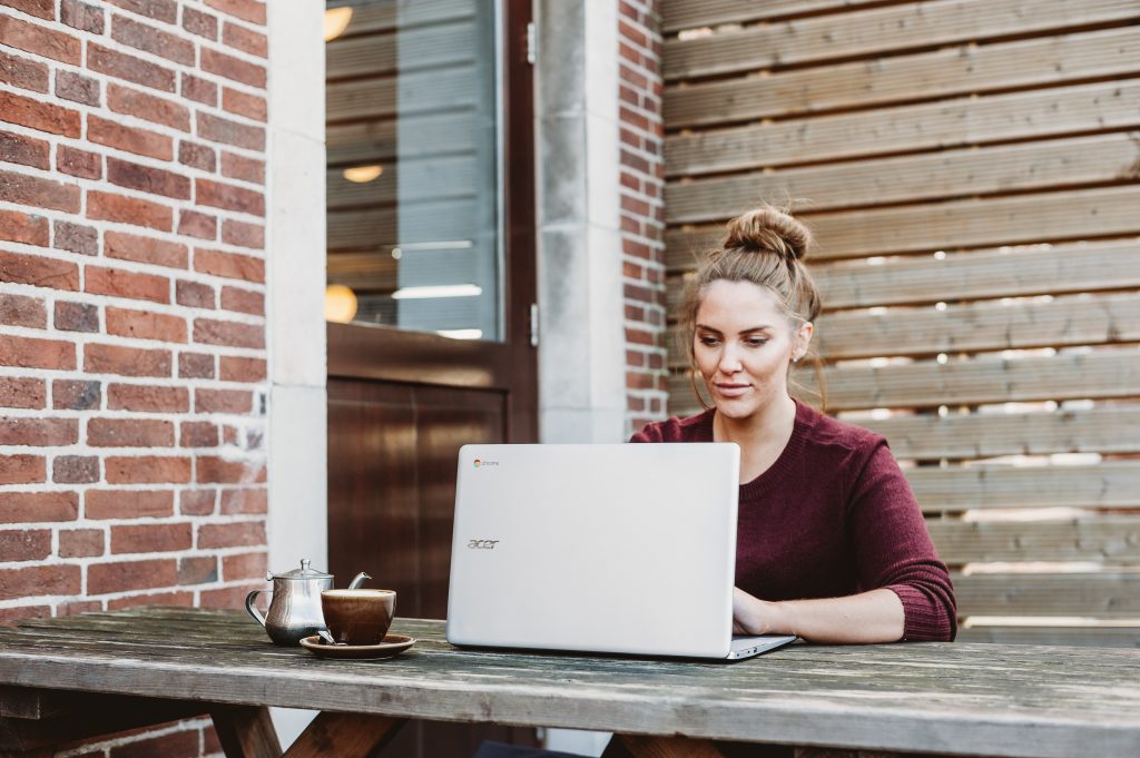 woman writing a CV